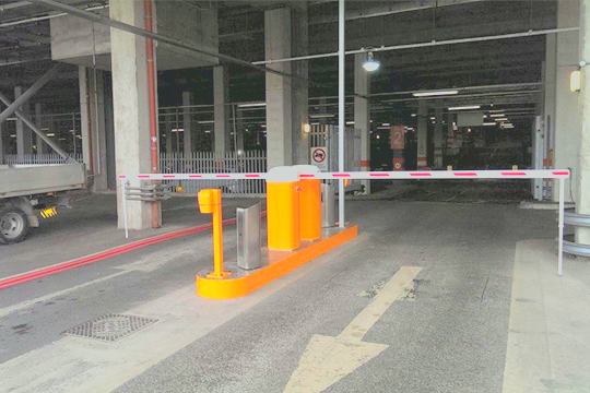 Turnstiles and vehicle barrier at a building entrance